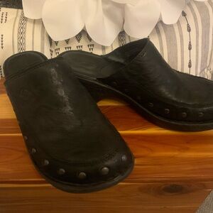 Born black leather clogs